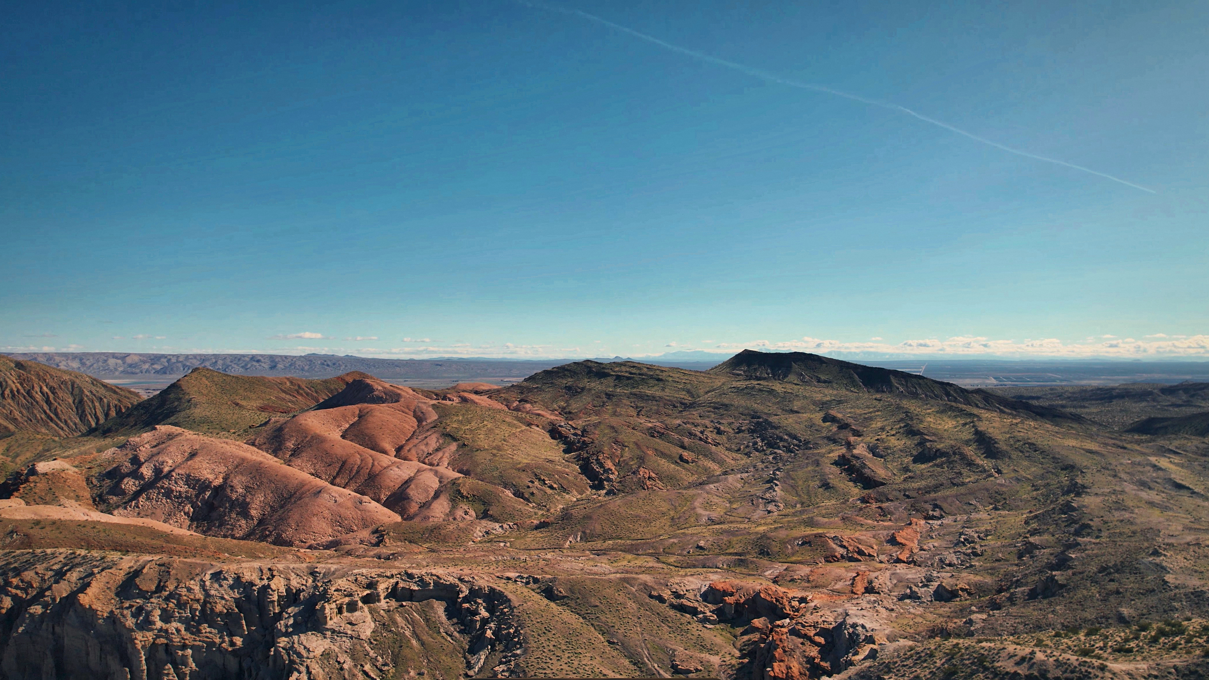 SKYSPECS Digital aerial photograph of desert hills and open terrain with cinematic natural light