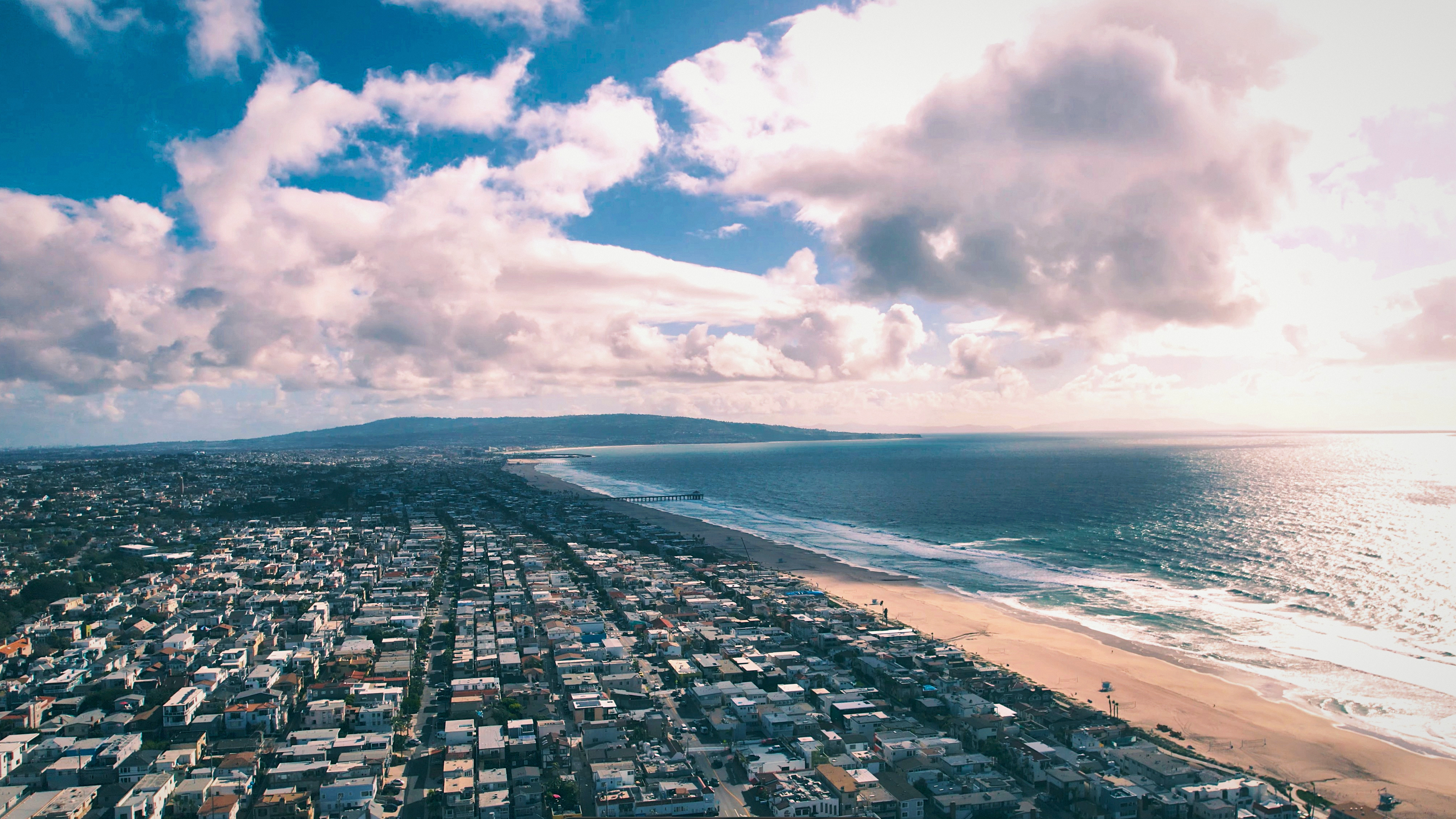 SKYSPECS Digital drone-style coastal aerial view of Manhattan Beach and shoreline