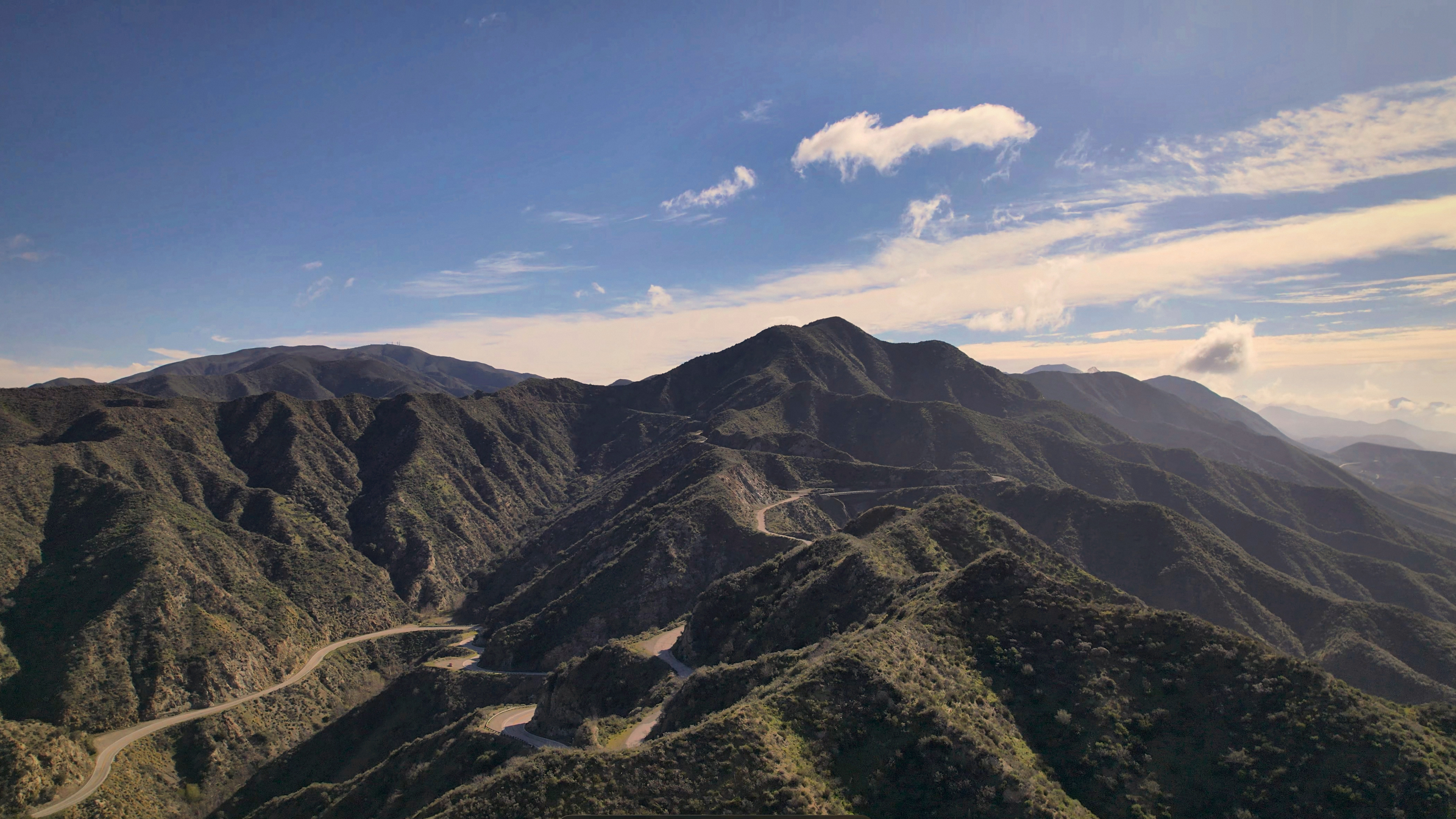 SKYSPECS Digital aerial photograph of Placerita Canyon road winding through Southern California hills